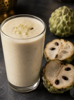 Glass of Sitaphal or Custart Apple Milkshake.